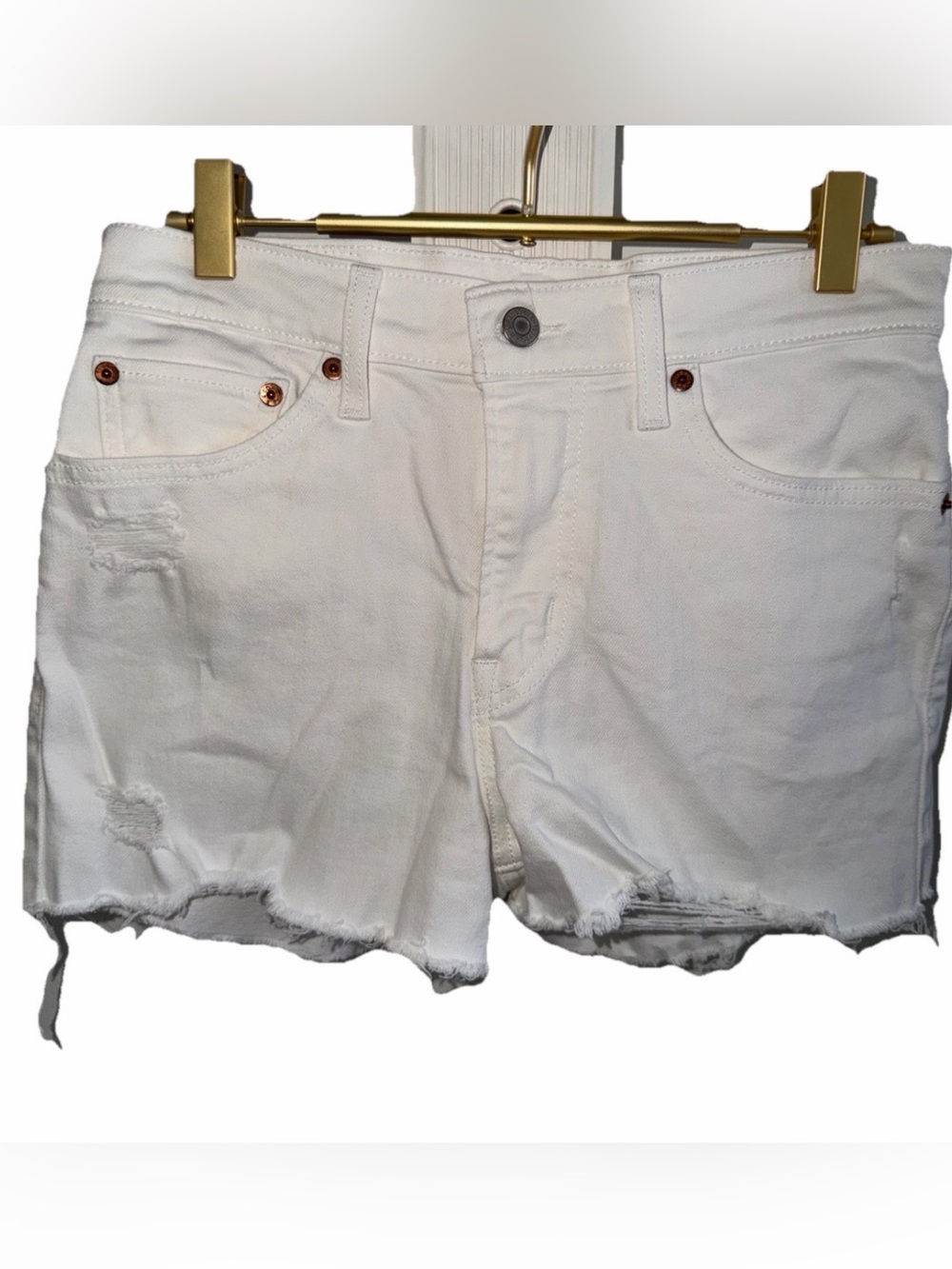 Levi’s High Rise White Distressed Hem Shorts Sz. 27